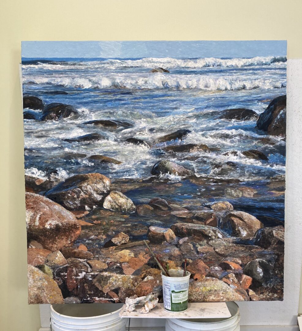 Applying over-beaten abaca to the surface of the painting.
