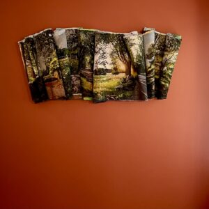 A piece of art hanging on the wall of a room.